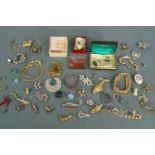 A quantity of vintage costume jewellery brooches etc including 1960s paua shell and tigereye cuff