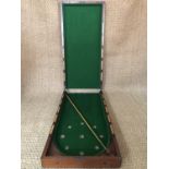 A Victorian mahogany folding table-top bagatelle board, 48 x 99 x 13 cm high (closed)