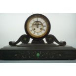 A large late 19th Century French malachite-inlaid polished black slate drum-head mantle clock