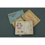 Three cigarette card albums including a RAF Badges, together with a small album of stamps
