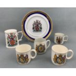 A City of Newcastle upon Tyne commemorative plate and tankard together with four commemorative cups