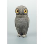 A Victorian novelty caster or pounce pot modelled as an owl, in pewter or Britannia metal with glass