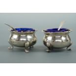 Two George V silver salts with cobalt blue glass liners and spoons