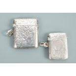Two Victorian foliate silver engraved vesta cases, one engraved with the initials 'JJ', Birmingham
