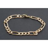 A yellow metal figaro link bracelet, 18 cm, 11.4 g