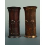 A pair of Keswick School of Industrial Art copper vases, each cylindrical with everted rim and