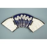 Eleven George V silver coffee spoons of moderne design, six presented in a fitted case, T. Wilkinson