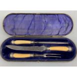 A cased Ivorine three piece carving set