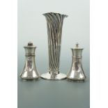 An Edwardian silver trumpet vase of spirally reeded form, HA, Birmingham, 1903, 14 cm, together with