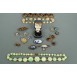 A quantity of vintage costume jewellery including a glass bead necklace, Victorian pendant locket,