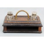 A Victorian mahogany desk tidy