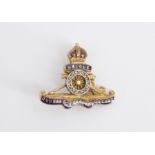 A Royal Artillery enamelled and diamond-set yellow metal sweetheart brooch, 25 mm x 20 mm, 3.4 g