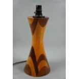 A 1950s - 1960s laminate wooden table lamp of opposed truncated conical form, 34 cm