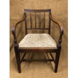 A set of eight Regency mahogany dining chairs