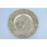 A Chinese brass charger, 40 cm diameter