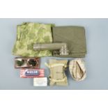 US army kit including an angle-headed torch, machine gun belt, parachute canopy fabric etc