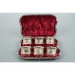 A cased set of Victorian electroplate napkin rings