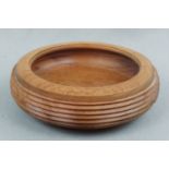 A turned purple heart wooden bowl