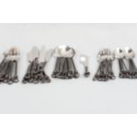 A 40-piece hand-crafted American Gourmet Setting 'Twist N Shout' cutlery set