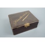 A Victorian gilt-tooled leather handkerchief box and contents, 17 cm x 14 cm x 6 cm
