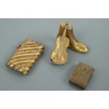 Four brass novelty and other vesta cases, modelled as a satchel, boot, and violin etc, late 19th /
