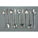 A set of nine Keswick School of Industrial Art Staybrite coffee spoons, having planished bowls and