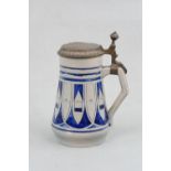 A German Fuchsturm stoneware lidded stein, 19cm high