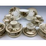 A Victorian Aesthetic-influenced earthenware tea set, each element of truncated conical form and