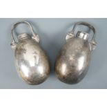 A pair of Victorian EPBM oviform riding spirit flasks, having screw-on caps and swing handles, 12