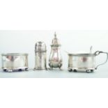 A George V silver condiment set, each item of oval section and comprising a salt cellar, mustard pot