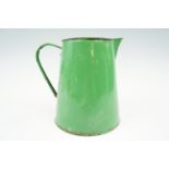 A vintage green enameled jug, 18 cm