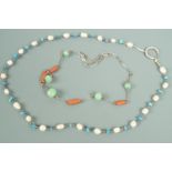 Two vintage necklaces set respectively with freshwater pearls, turquoise, branch coral and jade