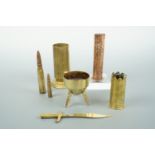 A group of trench art including a bullet letter knife and a 37 mm shell case engraved Bapaume