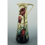 A contemporary Moorcroft jug, 24 cm, boxed