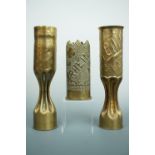 Three Great War commemorative trench art shell case vases, tallest 34 cm
