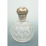 A Victorian silver mounted and cut glass grenade-form perfume bottle, having a threaded pommel