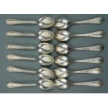 A set of 12 George V silver tea spoons, each stem beaded and reeded, Gorham Manufacturing Co,
