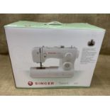 A Singer Talent electric sewing machine, model 3321