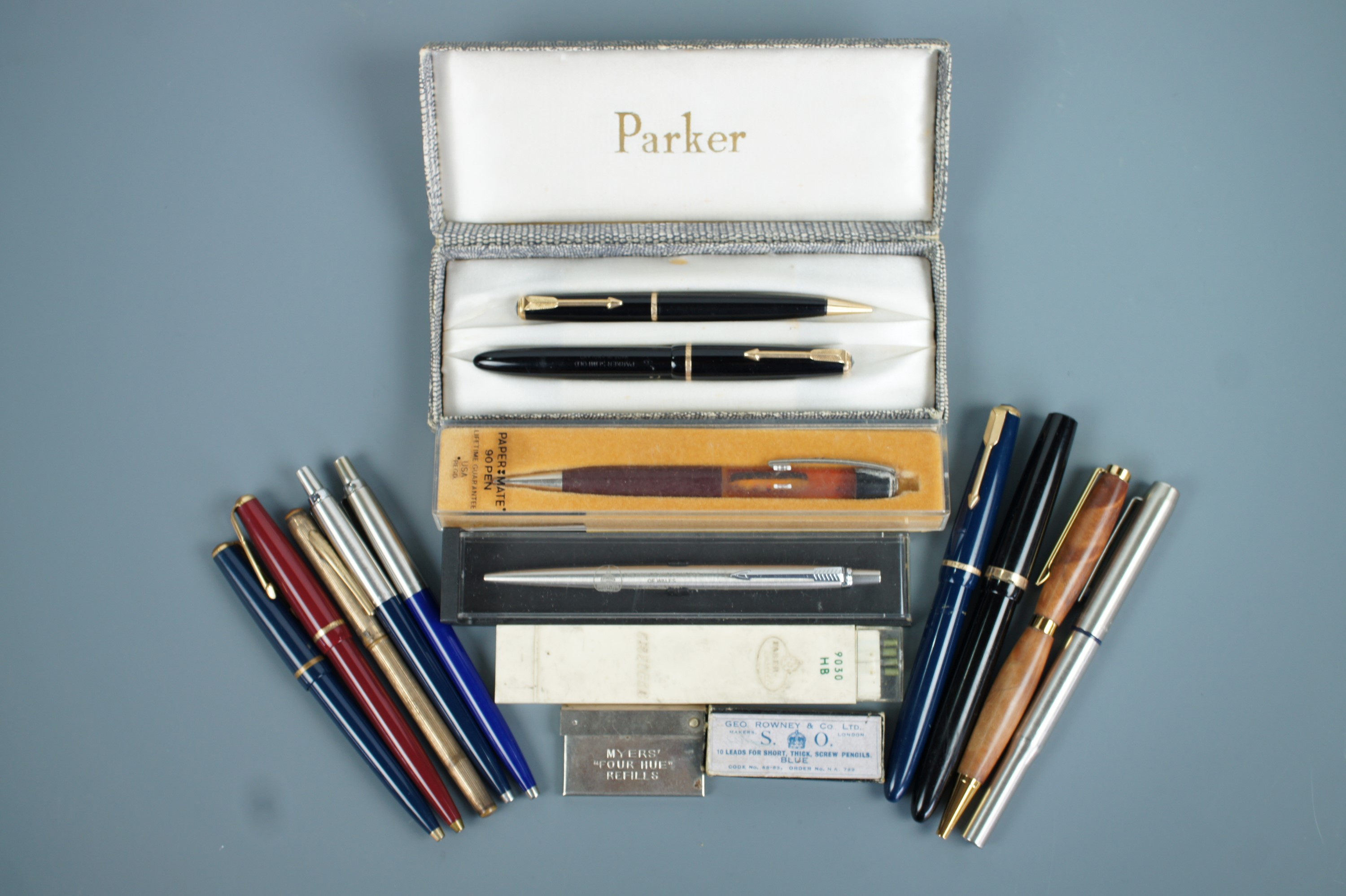 A Parker fountain pen together with a Parker and Papermate pens