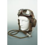 A Second World War Fleet Air Arm flying helmet with Gosport tubes, an early production example