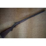 A Victorian percussion double barreled shotgun, (no license required)