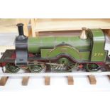 A live steam 3 1/2" gauge No 1 class Stirling Single railway locomotive and tender