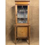 An Edwardian Sheraton Revival marquetry inlaid astragal glazed and bow fronted display cabinet, 66