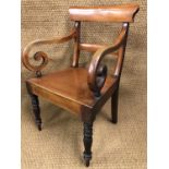 An early Victorian mahogany dining armchair