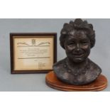 A cold-cast bronze sculpture of Queen Elizabeth the Queen Mother by Jill Tweed, in a limited edition