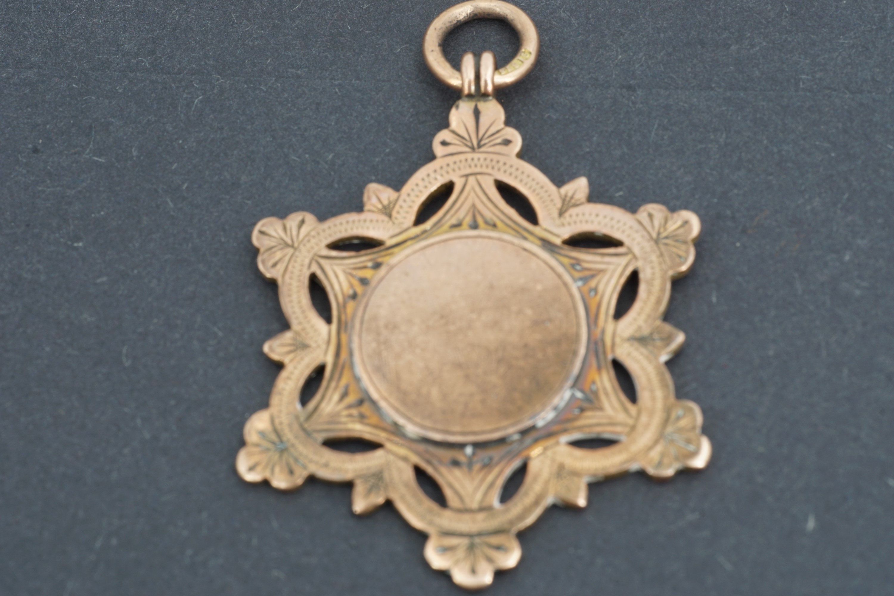 An Edwardian 9ct gold fob medallion, 10.6 g