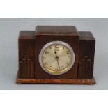A 1930s Ferranti oak-cased electric table or mantle clock, 22 cm x 15 cm