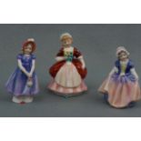 Three Royal Doulton figurines: Ivy, HN 1768; Dinky Do, HN 1678; Valerie, HN 2107