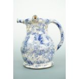 A late 19th / early 20th Century sponge ware puzzle jug, 14 cm