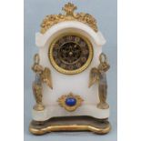 A 19th Century French alabaster table clock, of arched form with gilt metal and enamelled figural